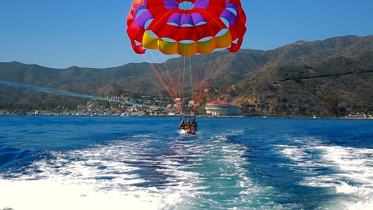 a parachute with a body of water